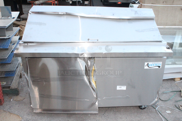 BRAND NEW SCRATCH & DENT! Avantco SS-PT-60M-HC 60" 2 Door Mega Top Stainless Steel Refrigerated Sandwich Prep Table. S/N: 130230645 60-1/4x35x45-7/8 Unit is dented and damaged. See photos. - Image 2 of 6