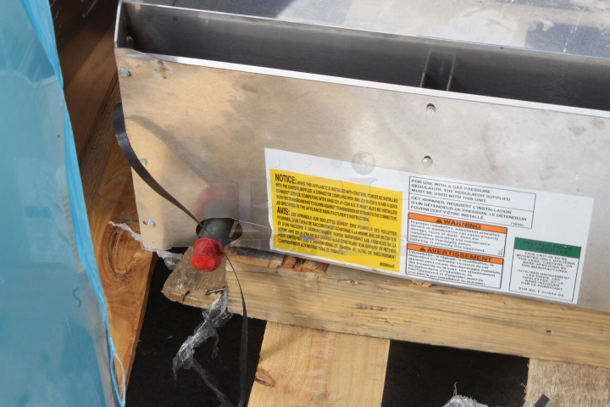 BRAND NEW SCRATCH & DENT! Wolf by Vulcan AGM60-NAT Natural Gas 60" Heavy-Duty Gas Countertop Griddle with Manual Controls - 135,000 BTU. Missing legs and minor denting.  - Image 5 of 5