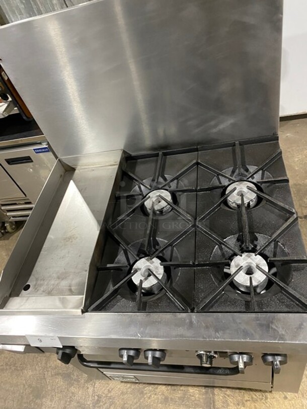 SouthBend Commercial Natural Gas Powered Split Top 4 Burner Stove! With Left Side Flat Griddle! With Full Sized Oven Underneath! With Backsplash! All Stainless Steel! With Metal Oven Racks! On Casters! Model: X336D-1GL SN: 04C65469! - Image 5 of 12