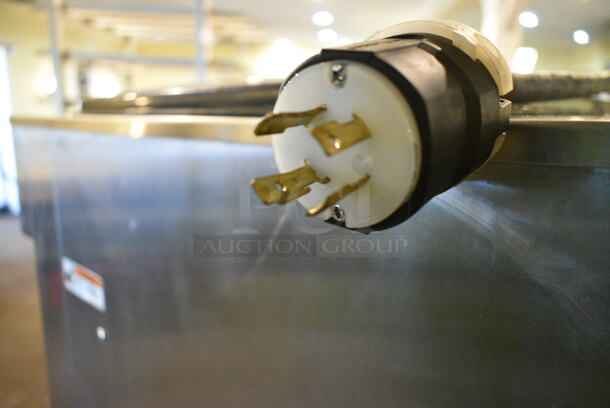 Electro Freeze SL500-132 Stainless Steel Commercial Floor Style Water Cooled 2 Flavor w/ Twist Soft Serve Ice Cream Machine on Commercial Casters. 208-230 Volts, 3 Phase. This Unit Was In Working Condition When the Restaurant Closed. (main dining room) - Image 3 of 10