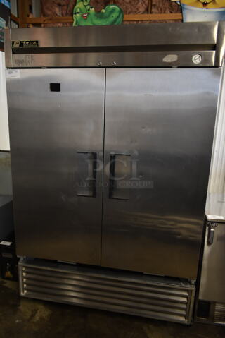 True T-49 Stainless Steel Commercial 2 Door Reach In Cooler w/ Poly Coated Racks on Commercial Casters. 115 Volts, 1 Phase. Tested and Powers On But Does Not Get Cold