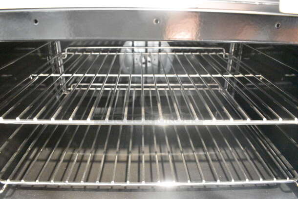BRAND NEW SCRATCH AND DENT! Cooking Performance Group CPG 351CC60N Stainless Steel Commercial Natural Gas Powered 10 Burner Range w/ 2 CONVECTION Ovens, Over Shelf and Back Splash. 364,000 BTU.  - Image 9 of 10