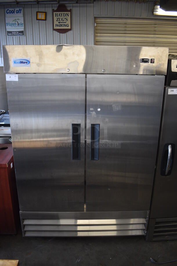 BRAND NEW SCRATCH AND DENT! KoolMore Model RIF-2D-SS Stainless Steel Commercial 2 Door Reach In Freezer w/ Poly Coated Racks and Keys on Commercial Casters. 115 Volts, 1 Phase. 53x33x82. Tested and Working!