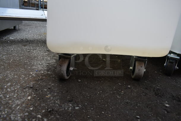 BRAND NEW SCRATCH AND DENT! Cambro IB44148 42.5 Gallon / 680 Cup White Flat Top Mobile Ingredient Storage Bin with Sliding Lid on Commercial Casters.  - Image 3 of 5