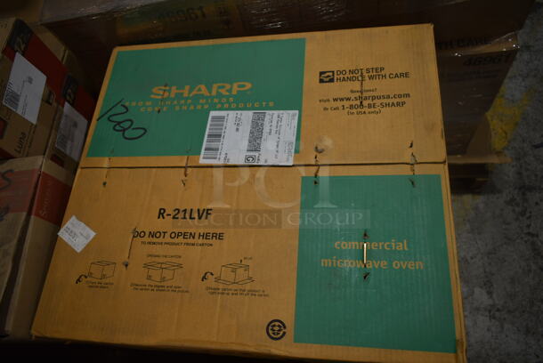 BRAND NEW IN BOX! Sharp R-21LVF Stainless Steel 1000w Commercial Microwave w/ Touch Pad. 120 Volts, 1 Phase.  - Image 2 of 4