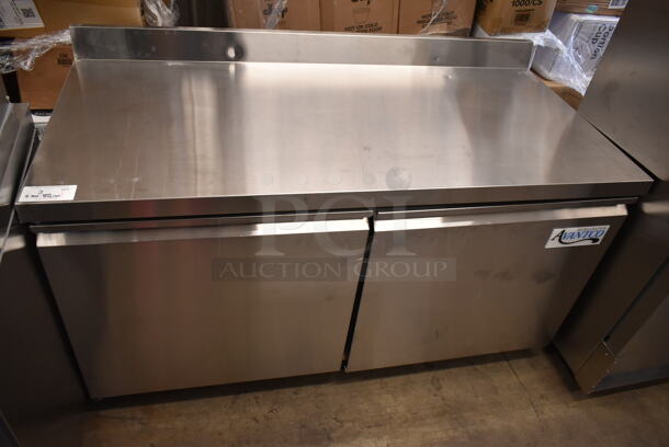 BRAND NEW SCRATCH AND DENT! 2023 Avantco 178SSWT60FHC Stainless Steel Commercial 2 Door Work Top Freezer on Commercial Casters. Right Door Does Not Stay Closed. 115 Volts, 1 Phase. Tested and Working! - Image 2 of 7
