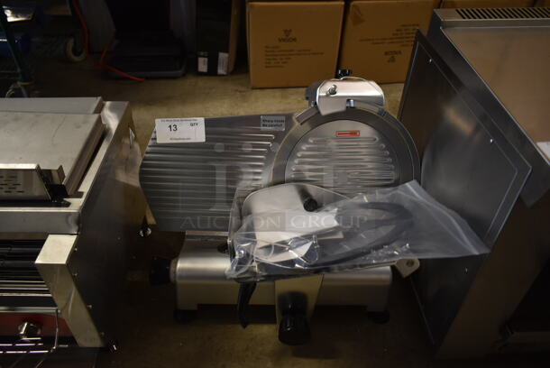 BRAND NEW SCRATCH AND DENT! 2023 Avantco  177SL312 Stainless Steel Commercial Countertop 12" Semi Automatic Meat Slicer w/ Blade Sharpener. 110-120 Volts, 1 Phase. Tested and Working! - Image 2 of 5