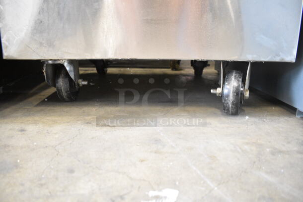 BRAND NEW SCRATCH AND DENT! Stainless Steel Commercial Natural Gas Powered Floor Style Tandoor Tandoori Oven on Commercial Casters.  - Image 4 of 10
