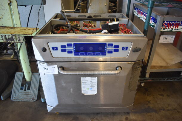 2010 Merrychef 402 Stainless Steel Commercial Countertop Electric Powered Rapid Cook Oven. 208/240 Volts, 1 Phase. 23x27x23