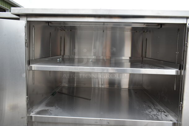 BRAND NEW SCRATCH AND DENT! Stainless Steel Commercial Counter w/ 2 Doors and Back Splash. - Image 7 of 7