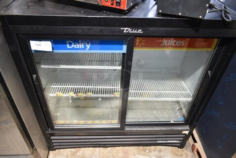 2018 True GDM-41SL-48-HC-LD Metal Commercial 2 Door Reach In Cooler Merchandiser w/ Poly Coated Racks. 115 Volts, 1 Phase. Tested and Working!