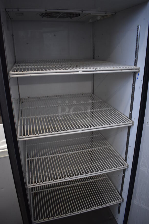 2010 True TG1R-1S Stainless Steel Commercial Single Door Reach In Cooler w/ Poly Coated Racks on Commercial Casters. 115 Volts, 1 Phase. 29x35x83. Tested and Working! - Image 4 of 5