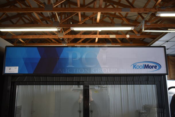 BRAND NEW SCRATCH AND DENT! 2023 KoolMore MDR-2D-GSLD Metal Commercial 2 Door Reach In Cooler Merchandiser w/ Poly Coated Racks on Commercial Casters. 115 Volts, 1 Phase. Tested and Working! - Image 4 of 9