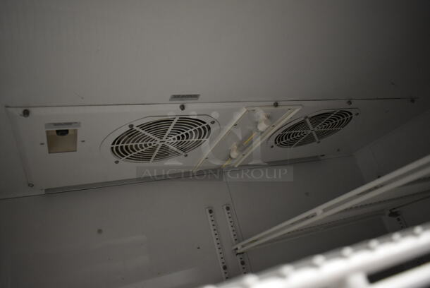 True TG2R-2S ENERGY STAR Stainless Steel Commercial 2 Door Reach In Cooler w/ Poly Coated Racks on Commercial Casters. 115 Volts, 1 Phase. Tested and Working! - Image 6 of 8