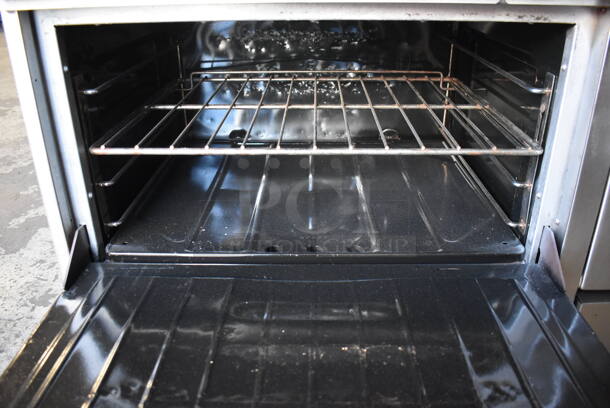 Stainless Steel Commercial Natural Gas Powered 10 Burner Range w/ 2 Ovens, Over Shelf and Back Splash on Commercial Casters. 60x33x58 - Image 6 of 7