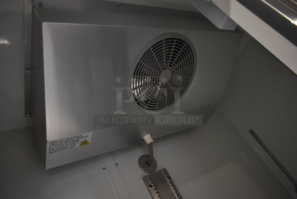 BRAND NEW SCRATCH AND DENT! 2023 Avantco 178A49RHC Stainless Steel Commercial 2 Door Reach In Cooler w/ Poly Coated Racks. 115 Volts, 1 Phase. Tested and Working! - Image 5 of 7