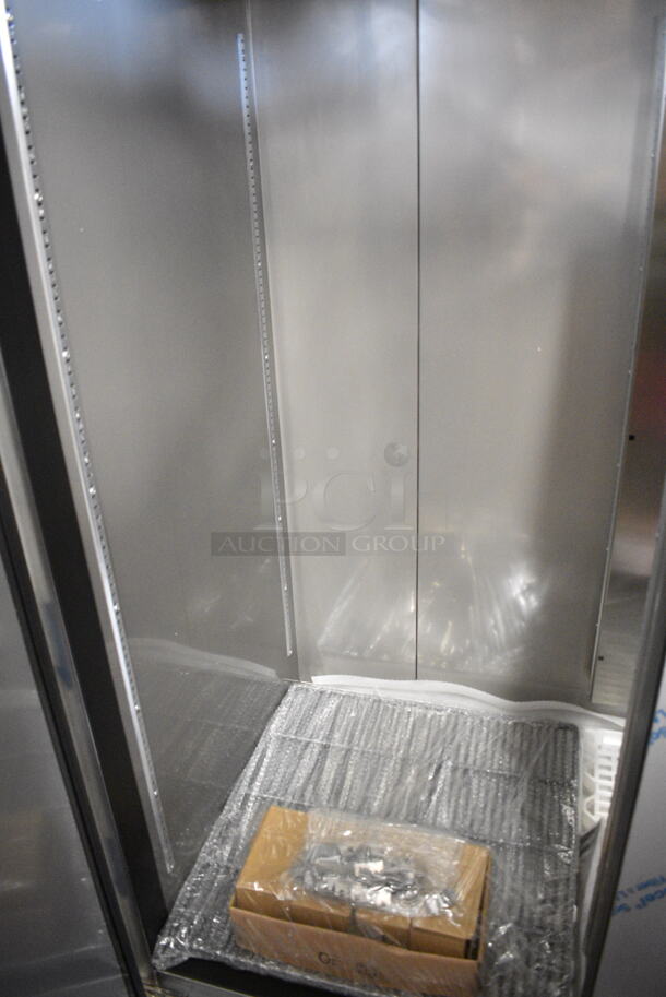 BRAND NEW SCRATCH AND DENT! 2023 Avantco 447AP49F Stainless Steel Commercial 55 3/8" Stainless Steel Solid Door Reach-In Freezer w/ Poly Coated Racks. 115 Volts, 1 Phase. Tested and Working! - Image 6 of 7