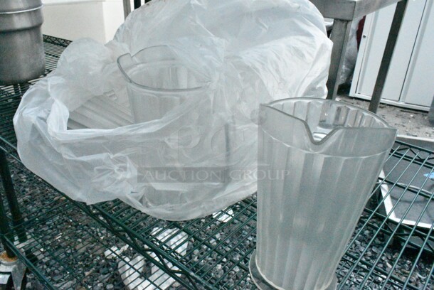 Green Finish 5 Tier Wire Shelving Unit on Commercial Casters w/ Contents Including Poly Lids and Poly Pitchers. BUYER MUST DISMANTLE. PCI CANNOT DISMANTLE FOR SHIPPING. PLEASE CONSIDER FREIGHT CHARGES.  - Image 6 of 8