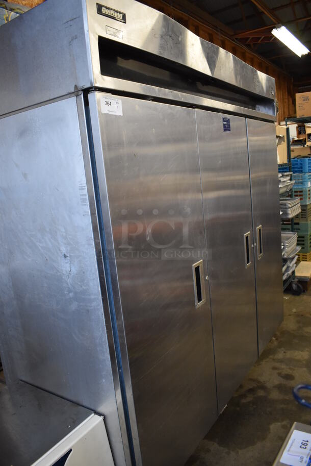 Delfield 6176-S Stainless Steel Commercial 3 Door Reach In Cooler on Commercial Casters. 115 Volts, 1 Phase. 76x32.5x80. Tested and Does Not Power On - Image 3 of 7