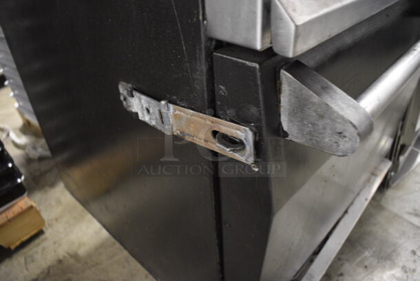 Vulcan Stainless Steel Commercial Natural Gas Powered 4 Burner Range w/ Oven and Back Splash. 24x30x62 - Image 4 of 4