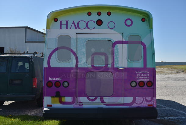 2011 Ford Ecoline Passenger Bus. Odometer Reads 29,039. VIN 1FDFE4FS5BDB14627. Title In Hand. The bus is a 14-passenger, with a space for a wheelchair to fasten to the floor. Vehicle Runs and Drives But Battery Needs To Be Reconnected. See Lot #12 For Additional Pictures - Image 6 of 12