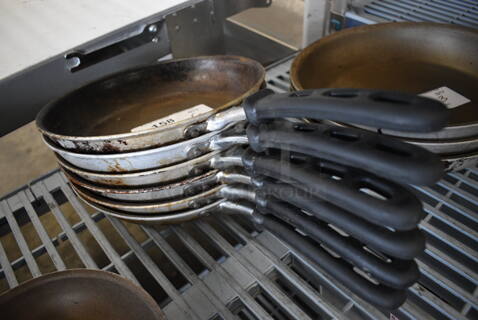 6 Metal Skillets. 18.5x10.5x2. 6 Times Your Bid!