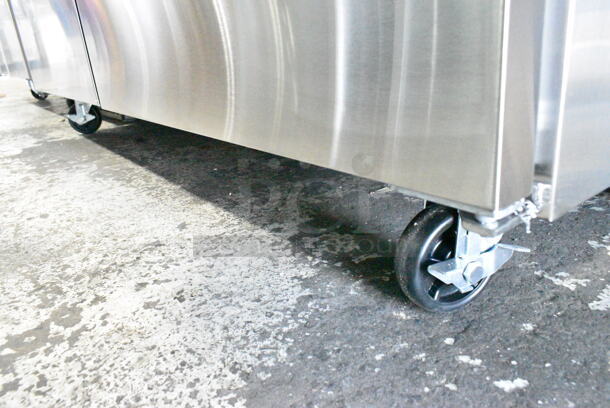BRAND NEW SCRATCH AND DENT! 2024 Avantco 178SSPT60MHC Stainless Steel  60" 2 Door Mega Top Stainless Steel Refrigerated Sandwich Prep Table on Commercial Casters. 115 Volts, 1 Phase. Tested and Working! - Image 6 of 10