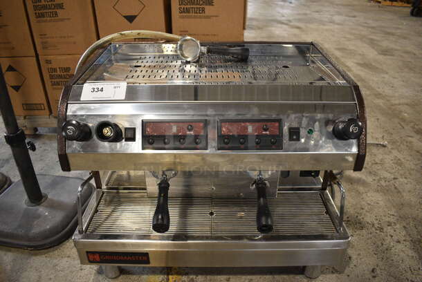 Grindmaster Model ESP2 Stainless Steel Commercial Countertop 2 Group Espresso Machine w/ 3 Portafilters and 2 Steam Wands. 220-240 Volts, 1 Phase. 28x22x22