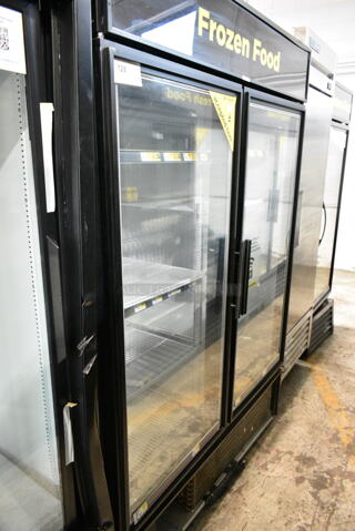 True GDM-49F-LD Metal Commercial 2 Door Reach In Freezer Merchandiser w/ Poly Coated Racks. 115/208-230 Volts, 1 Phase. Tested and Working!
