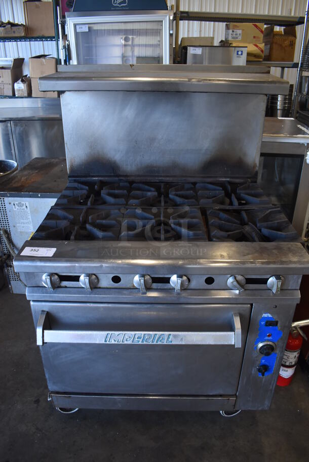 Imperial Stainless Steel Commercial Natural Gas Powered 6 Burner Range w/ Convection Oven, Over Shelf and Back Splash on Commercial Casters. 36x33x57 - Image 1 of 7