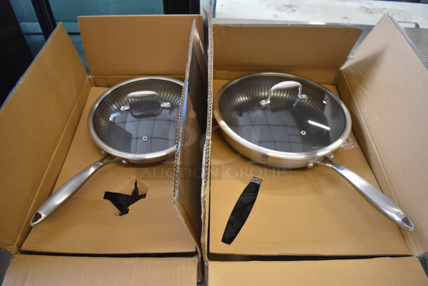 2 BRAND NEW IN BOX! Nutrichef Skillets w/ Lids. NC3PL12 and NC3PL10. 21x12.5x5, 18.5x11x3. 2 Times Your Bid! - Image 1 of 8