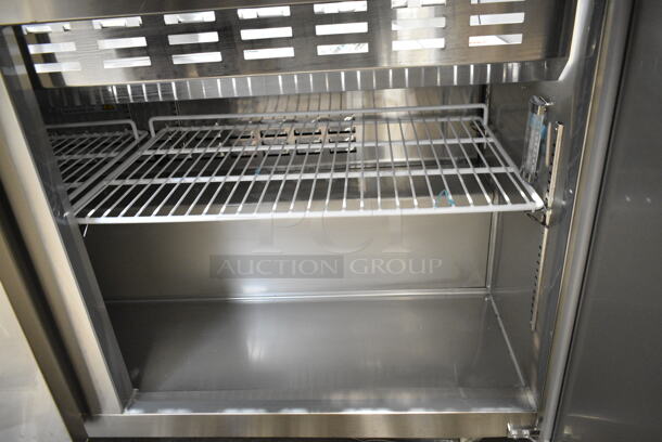 BRAND NEW SCRATCH AND DENT! 2023 Avantco 178SSPT60MHC  60" 2 Door Mega Top Stainless Steel Refrigerated Sandwich Prep Table on Commercial Casters. 115 Volts, 1 Phase. Tested and Working! - Image 7 of 9