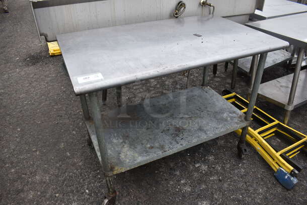 Stainless Steel Table w/ Metal Under Shelf on Commercial Casters. 48x30x37.5