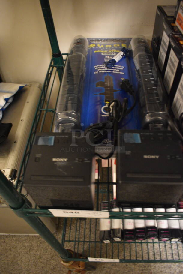 ALL ONE MONEY! Tier Lot of Various Items Including Sony Alarm Clock, Surge Protectors, and Black Case - Image 2 of 4