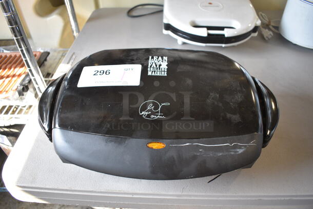 George Foreman Model GRP4B Metal Countertop Grilling Machine. 120 Volts, 1 Phase. 16x10x4.5. Tested and Working!