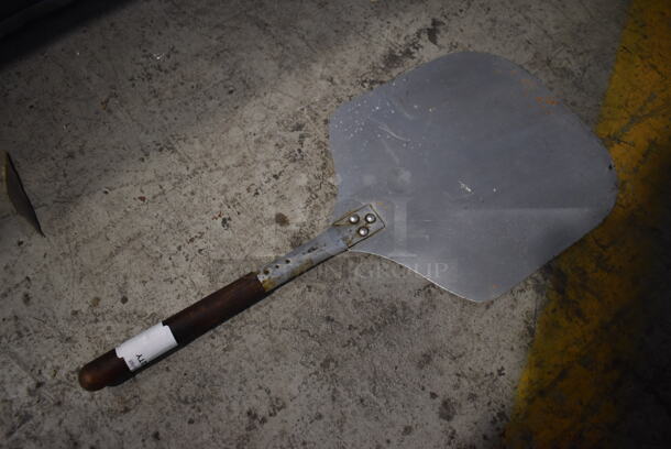 Metal Pizza Paddle w/ Wooden Handle. 12x26x1 - Image 1 of 2