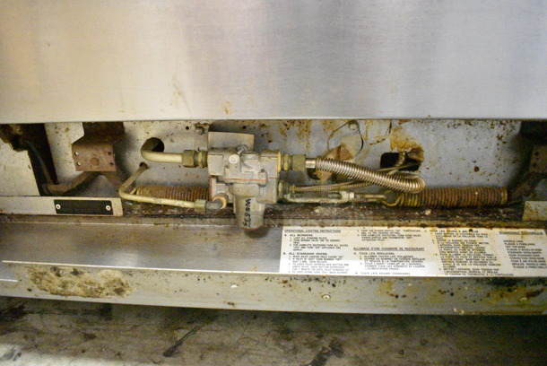 Vulcan 36XTL-559 Stainless Steel Commercial Propane Gas Powered Flat Top Griddle w/ Oven, Over Shelf and Back Splash on Commercial Casters. - Image 6 of 7