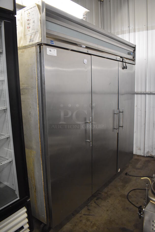 Delfield Stainless Steel Commercial 3 Door Reach In Cooler w/ Poly Coated Racks on Commercial Casters. 77x34x80. Tested and Working! - Image 2 of 9