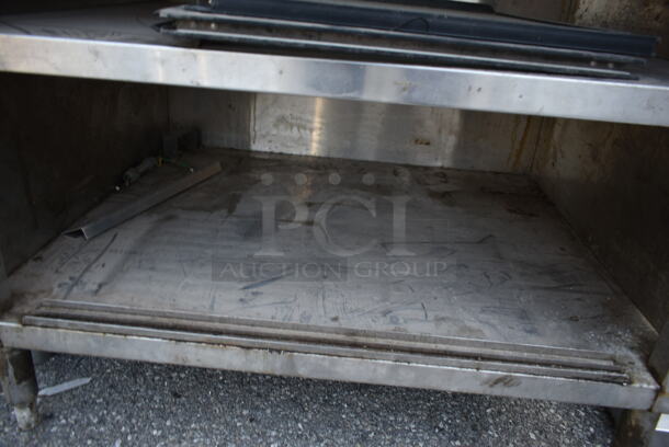Stainless Steel Table w/ Back Splash and 2 Under Shelves. - Image 4 of 5