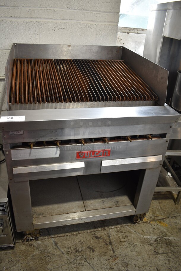 Vulcan Stainless Steel Commercial Gas Powered Charbroiler Grill w/ Under Shelf on Commercial Casters.  - Image 1 of 6