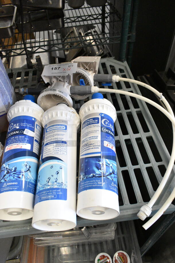 ALL ONE MONEY! Lot of 2 Water Filter Heads and 3 C Pure Water Filter Cartridges.  - Image 1 of 8