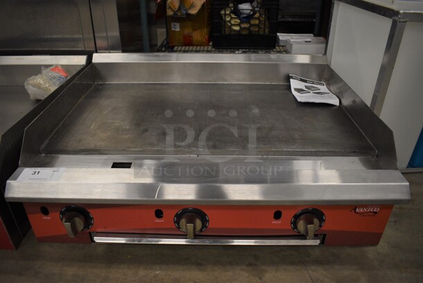 Avantco Stainless Steel Commercial Countertop Natural Gas Powered Flat Top Griddle. 36x29x12.5