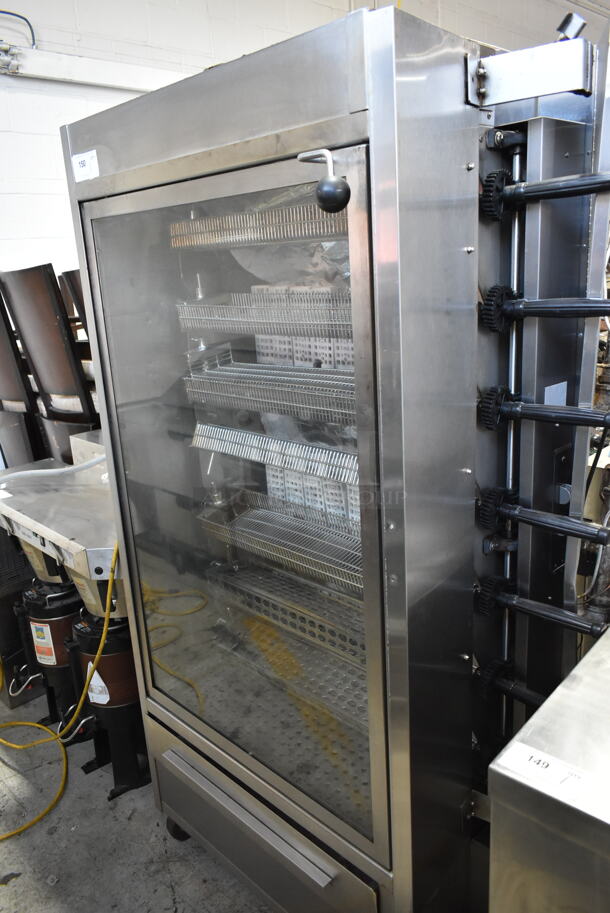 Stainless Steel Commercial Floor Style Natural Gas Powered 7 Spit Rotisserie Oven on Commercial Casters. - Image 1 of 7