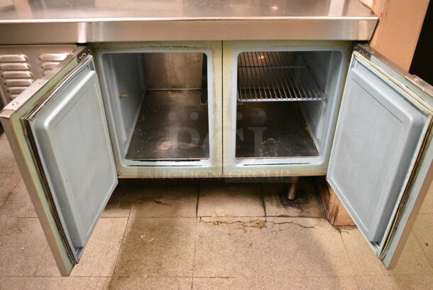 Delfield Stainless Steel Commercial Refrigerated Prep Table w/ 2 Lower Doors. BUYER MUST REMOVE: Bring Tools and Manpower Needed To Remove This Item. This Unit Was In Working Condition When the Restaurant Closed. (kitchen entryway) - Image 2 of 7