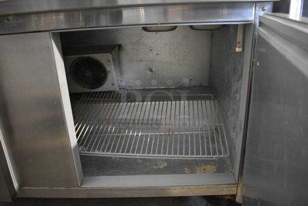 Beverage Air Stainless Steel Commercial Sandwich Salad Prep Table Bain Marie Mega Top w/ Various Drop In Bins and Cutting Board on Commercial Casters. 115 Volts, 1 Phase. 60x27.5x41. Tested and Powers On But Temps at 51 Degrees - Image 6 of 8