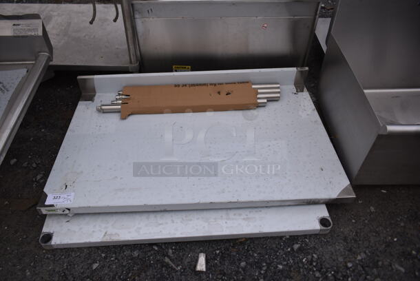 BRAND NEW SCRATCH AND DENT! Regency 600TSB3048S 30" x 48" 16-Gauge Stainless Steel Commercial Work Table with 4" Backsplash and Undershelf - Image 2 of 6