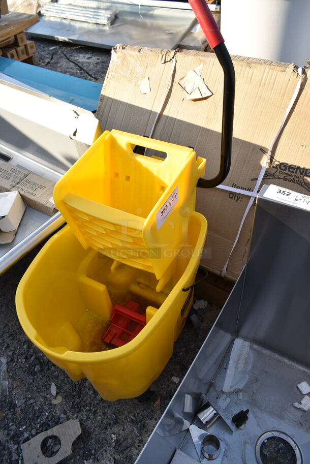 BRAND NEW SCRATCH AND DENT! Yellow Poly Mop Bucket w/ Wringing Attachment on Commercial Casters.  - Image 1 of 4