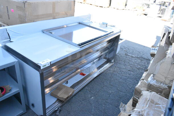 BRAND NEW SCRATCH AND DENT! Regency 600EBTB3072D 30" x 72" 16 Gauge Type 304 Stainless Steel Enclosed Base Sliding Door Table with Adjustable Midshelf and 6" Backsplash - Image 2 of 10
