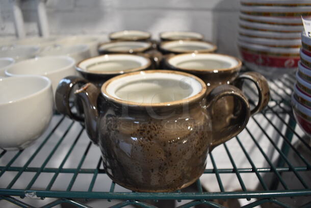 7 Brown and White Ceramic Teapots. 7x4x3.5. 7 Times Your Bid! 
