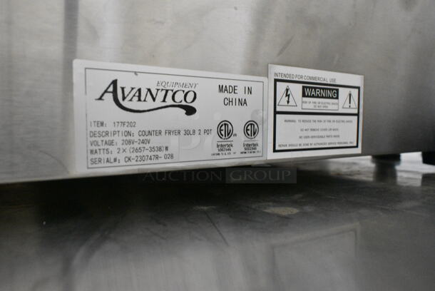 2023 Avantco 177F202 Stainless Steel Commercial Countertop Electric Powered 2 Bay Fryer w/ Lids and Metal Fry Baskets. 208-240 Volts, 1 Phase.
 - Image 10 of 10